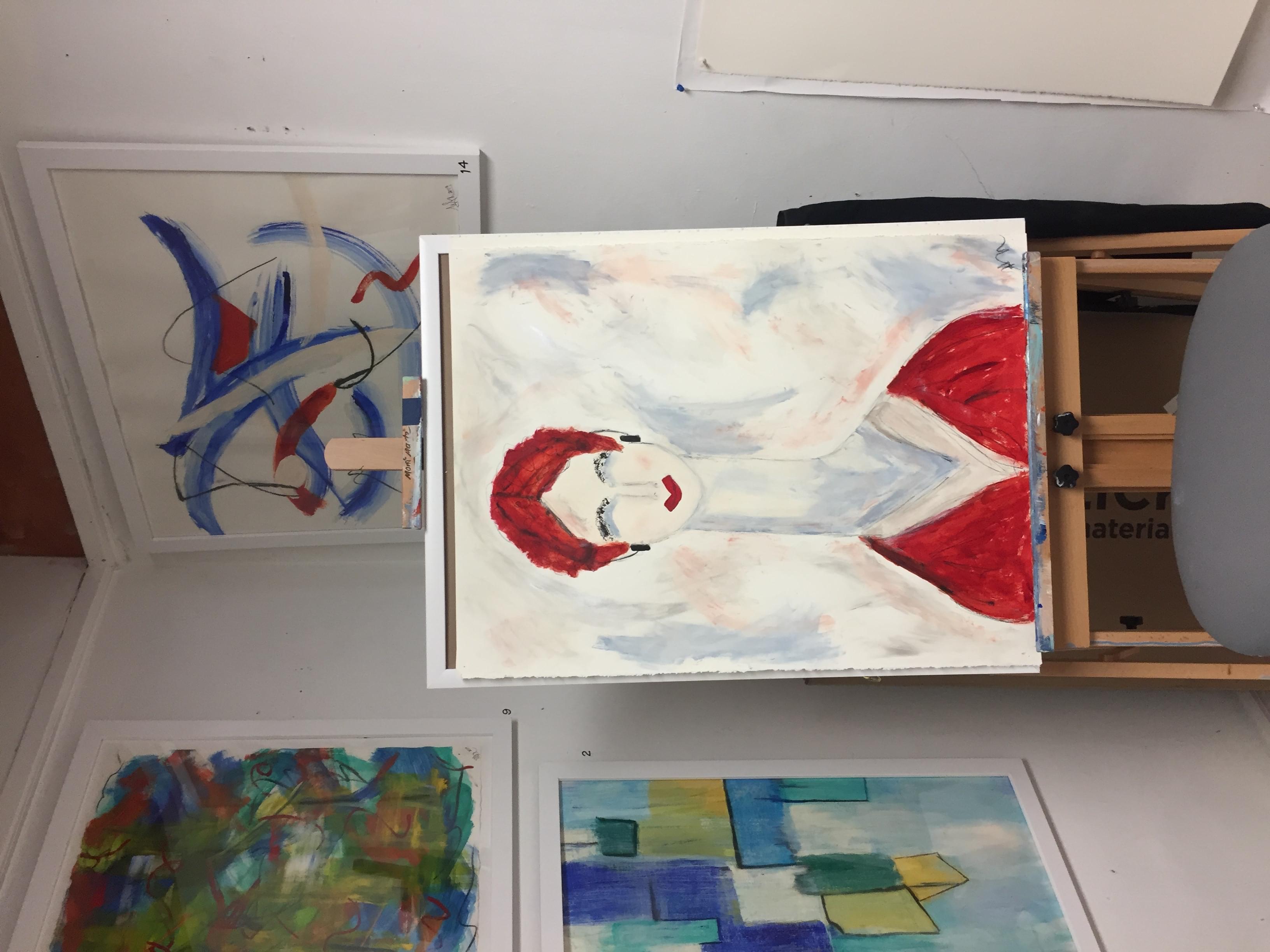 redhead painting in the studio